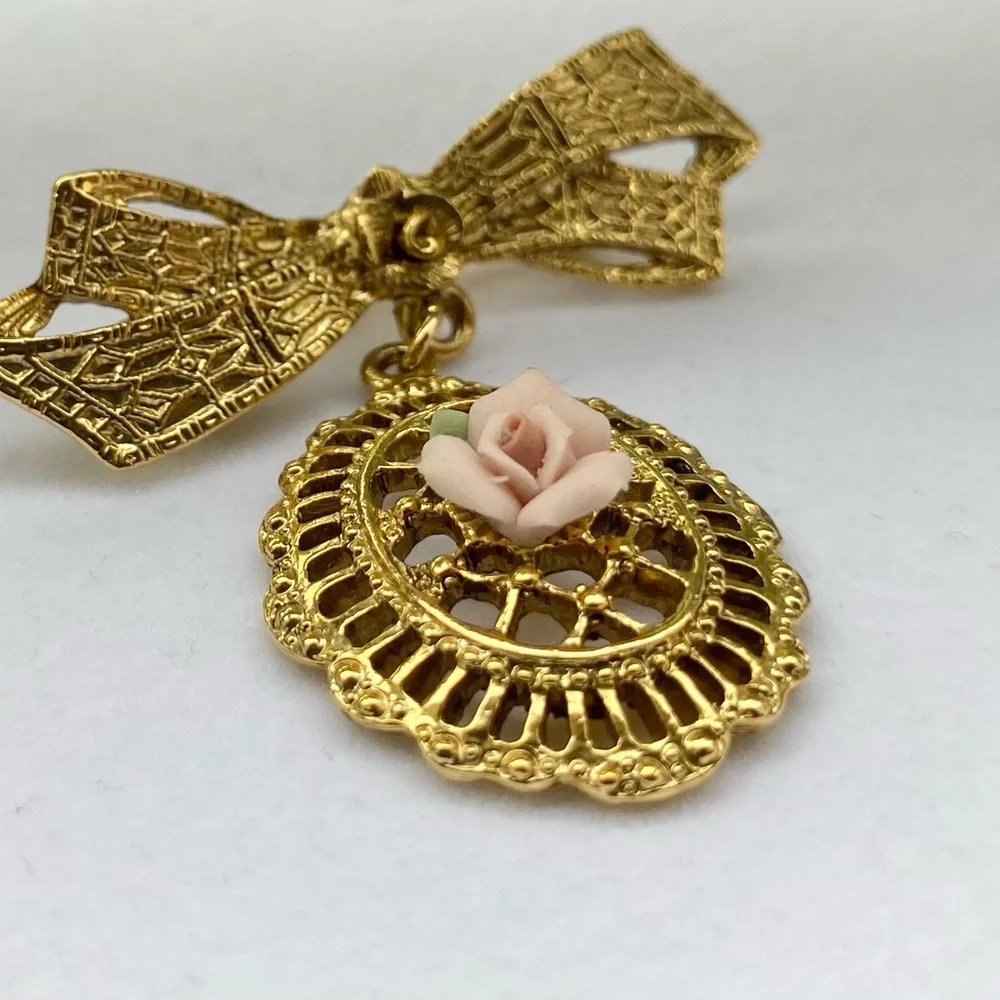 Vintage Goldtone Ribbon Bow with Porcelain Pink Rose Brooch
